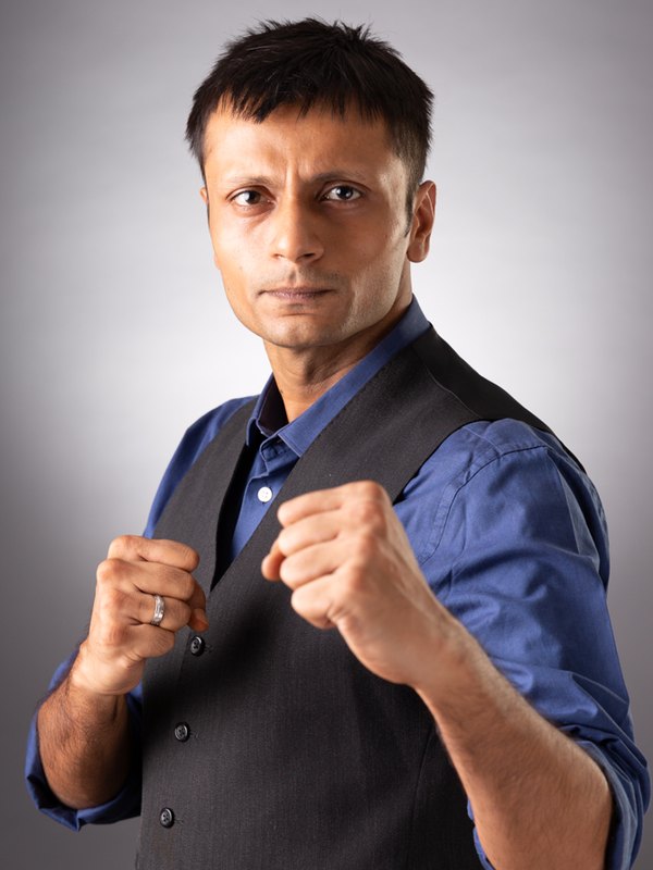 Aditya Singh, founder of KombatOS and second degree black belt, in a fighting guard